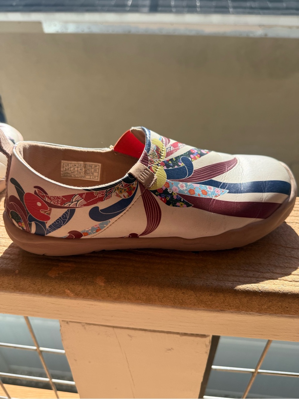 UIN White Floral-Pattern Slip-On Shoes with Blue and Red Accents - Picture 9 of 16